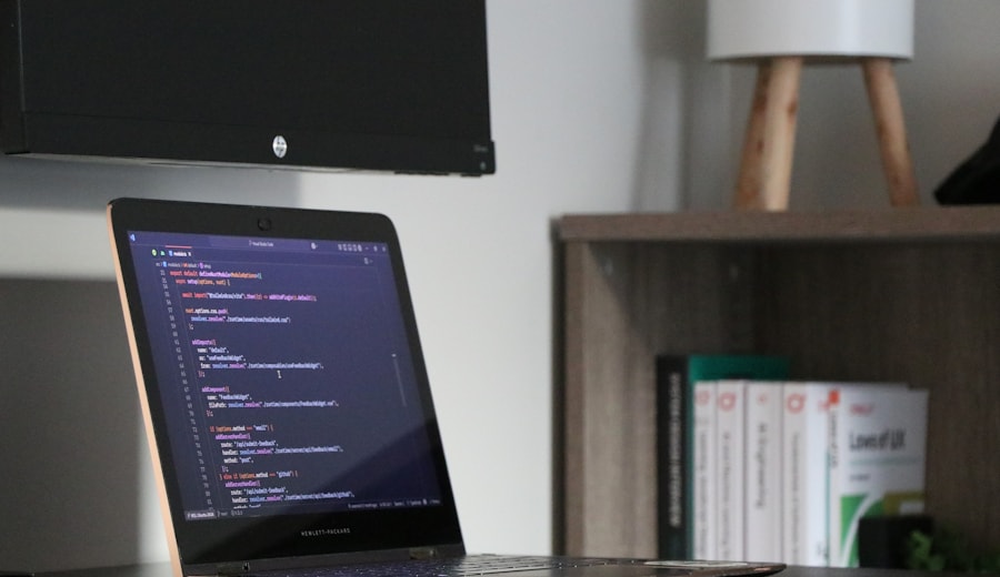 Laptop displaying website development code